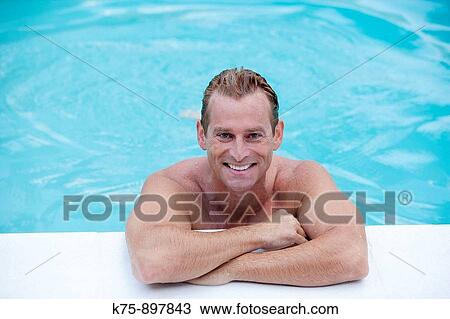 Man poolside View Large Photo Image Stock Image - Man poolside. Fotosearch