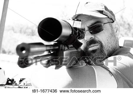 man practicing archery View Large Photo Image Stock Photograph - man practicing archery. Fotosearch