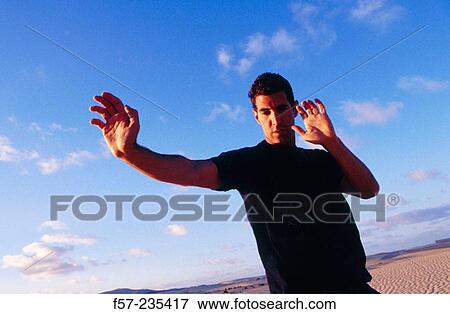 Man practicing yoga View Large Photo Image Stock Photo - Man practicing yoga. Fotosearch