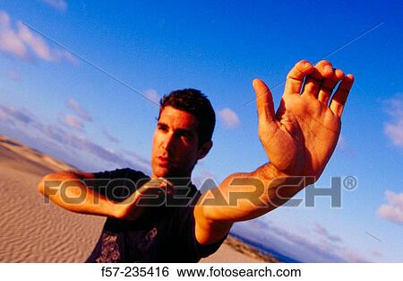 Man practicing yoga View Large Photo Image Stock Photograph - Man practicing yoga. Fotosearch
