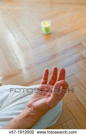 Man practising yoga, sitting in the lotus position. Close view. View Large Photo Image Stock Image - Man practising yoga, sitting in the lotus position. Close view.. Fotosearch