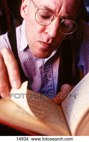 Man reading book View Large Photo Image Picture - Man reading book. Fotosearch