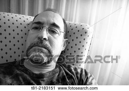 Man resting at his home in Peniscola, Castell? n, Valencia, Spain. View Large Photo Image Stock Image - Man resting at his home in Peniscola, Castell? n, Valencia, Spain.. Fotosearch