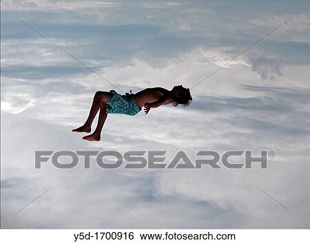 man resting in the sky View Large Photo Image Stock Photograph - man resting in the sky. Fotosearch