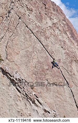 Man rock climbing a route called El Castletan which is rated 5, 10 and located on Castle Rock at Castle Rocks State Park near the town of Almo in southern Idaho View Large Photo Image Stock Photograph - Man rock climbing a route called El Castletan which is rated 5, 10 and located on Castle Rock at Castle Rocks State Park near the town of Almo in southern Idaho. Fotosearch