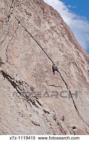 Man rock climbing a route called El Castletan which is rated 5, 10 and located on Castle Rock at Castle Rocks State Park near the town of Almo in southern Idaho View Large Photo Image Stock Photography - Man rock climbing a route called El Castletan which is rated 5, 10 and located on Castle Rock at Castle Rocks State Park near the town of Almo in southern Idaho. Fotosearch