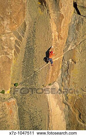 Man rock climbing a route called Strategic Defense which is rated 5, 11 and located on Morning Glory Spire at The City Of Rocks National Reserve in southern Idaho USA View Large Photo Image Stock Image - Man rock climbing a route called Strategic Defense which is rated 5, 11 and located on Morning Glory Spire at The City Of Rocks National Reserve in southern Idaho USA. Fotosearch