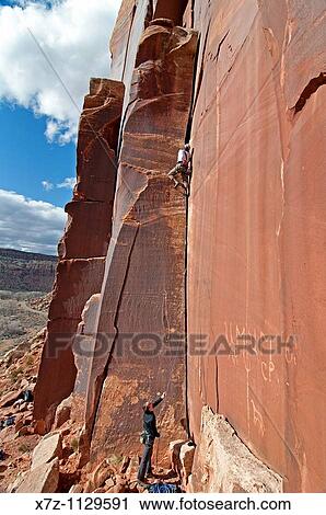 Man rock climbing a route called Amaretto Corner on Super Crack Buttress at Indian Creek Canyon in southern Utah View Large Photo Image Stock Image - Man rock climbing a route called Amaretto Corner on Super Crack Buttress at Indian Creek Canyon in southern Utah. Fotosearch