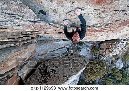 Man rock climbing a route named Shop And Compare which is rated 5, 10 and located on the Competition Wall at Castle Rocks State Park near the city of Almo in southern Idaho View Large Photo Image Stock Image - Man rock climbing a route named Shop And Compare which is rated 5, 10 and located on the Competition Wall at Castle Rocks State Park near the city of Almo in southern Idaho. Fotosearch