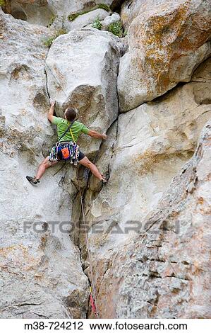 Man rock climbing, City of Rocks, Idaho, USA View Large Photo Image Stock Image - Man rock climbing, City of Rocks, Idaho, USA. Fotosearch