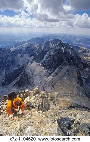 Man, rock climbing free solo The Friction Pitch of the Exum Ridge route on The Grand Teton in Grand Teton National Park, Wyoming View Large Photo Image Stock Image - Man, rock climbing free solo The Friction Pitch of the Exum Ridge route on The Grand Teton in Grand Teton National Park, Wyoming. Fotosearch