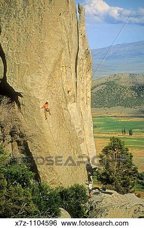 Stock Photograph - Man, rock climbing Sancho Rama near the Upper Competition Wall at Castle Rocks State Park near the town of Almo, Idaho. Fotosearch