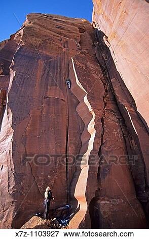 Man, rock climbing Wavy Gravy on the Scarface Wall in Indian Creek Canyon near the town of Moab in southern Utah View Large Photo Image Stock Photo - Man, rock climbing Wavy Gravy on the Scarface Wall in Indian Creek Canyon near the town of Moab in southern Utah. Fotosearch