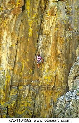 Man, rock climbing Yellow Wall on the Yellow Wall formation at City Of Rocks National Reserve near the town of Almo, Idaho View Large Photo Image Stock Image - Man, rock climbing Yellow Wall on the Yellow Wall formation at City Of Rocks National Reserve near the town of Almo, Idaho. Fotosearch