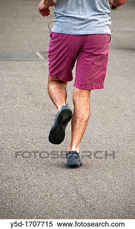 man running the street, legs only, fitness, Geneva, Switzerland View Large Photo Image Stock Photography - man running the street, legs only, fitness, Geneva, Switzerland. Fotosearch