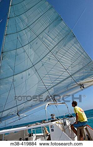 Man sailing a catamaran in Key West, Florida. December 2004. View Large Photo Image Picture - Man sailing a catamaran in Key West, Florida. December 2004.. Fotosearch