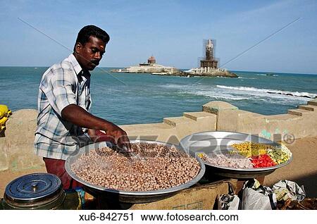 Stock Image - Man selling Chaat at the southern most point of India Kanyakumari Cape Comorin. Fotosearch