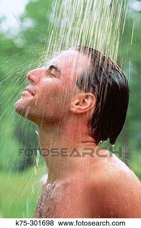 man showering outdoors View Large Photo Image Stock Photo - man showering outdoors. Fotosearch