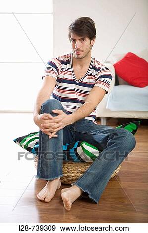 Man sitting, portrait View Large Photo Image Stock Photo - Man sitting, portrait. Fotosearch