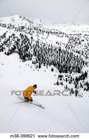 Man skiing in Kicking Horse Mt. Golden, British Columbia, Canada View Large Photo Image Stock Image - Man skiing in Kicking Horse Mt. Golden, British Columbia, Canada. Fotosearch