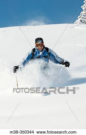 Man skiing in Sun Valley, Idaho. USA View Large Photo Image Picture - Man skiing in Sun Valley, Idaho. USA. Fotosearch
