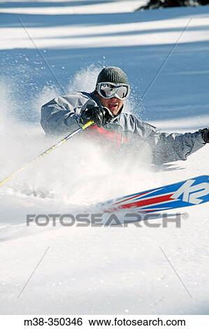 Man skiing in Sun Valley, Idaho. USA View Large Photo Image Stock Photograph - Man skiing in Sun Valley, Idaho. USA. Fotosearch