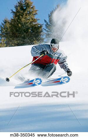 Stock Photography - Man skiing in Sun Valley, Idaho. USA. Fotosearch
