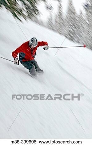 Stock Photograph - Man skiing in Taos, New Mexico. USA. Fotosearch