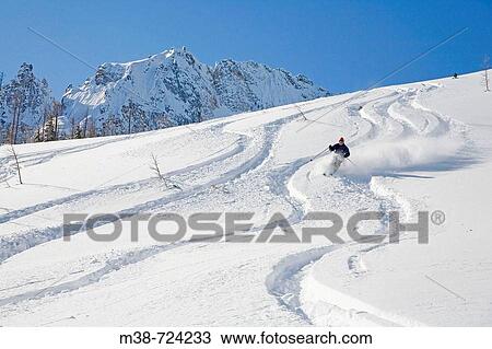 Man skiing, North Cascades, Washington, USA View Large Photo Image Stock Image - Man skiing, North Cascades, Washington, USA. Fotosearch