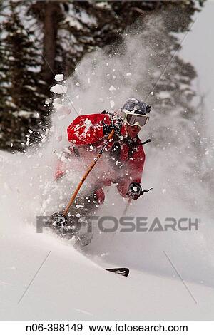 Man skiing powder snow in the Sawtooth Mountains of Idaho near Mount Williams. USA View Large Photo Image Stock Photo - Man skiing powder snow in the Sawtooth Mountains of Idaho near Mount Williams. USA. Fotosearch