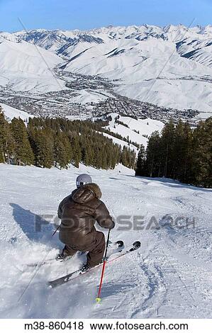 Stock Photo - Man skiing Sun Valley, Idaho. Fotosearch
