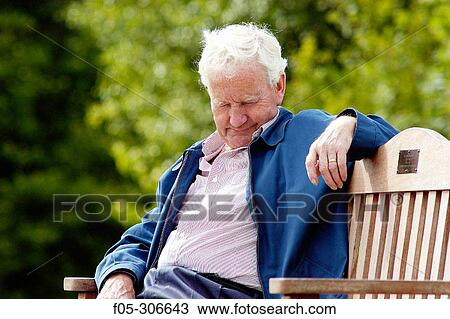 Man sleeping on bench View Large Photo Image Stock Image - Man sleeping on bench. Fotosearch