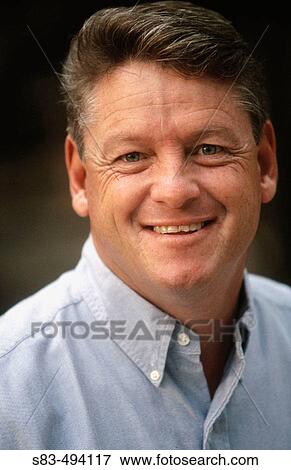 Stock Photo - Man smiling. Fotosearch