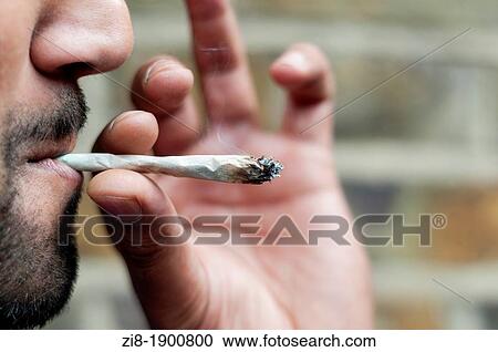 Man smoking cannabis-close-up View Large Photo Image Stock Image - Man smoking cannabis-close-up. Fotosearch