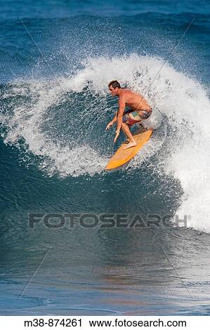 Man surfing in Maui, Hawaii View Large Photo Image Stock Image - Man surfing in Maui, Hawaii. Fotosearch