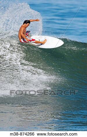 Man surfing in North Shore of Oahu, Hawaii View Large Photo Image Stock Photograph - Man surfing in North Shore of Oahu, Hawaii. Fotosearch