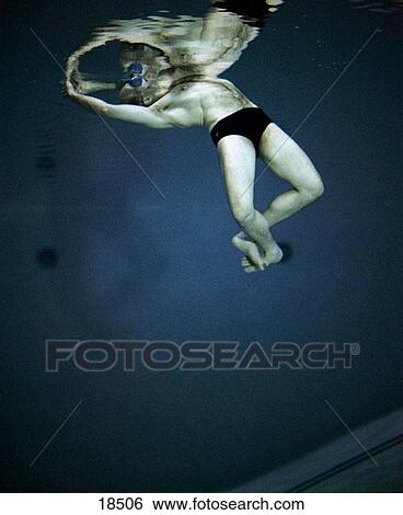 Stock Photograph - Man swimming. Fotosearch