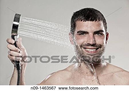 Man takes a shower View Large Photo Image Stock Photo - Man takes a shower. Fotosearch