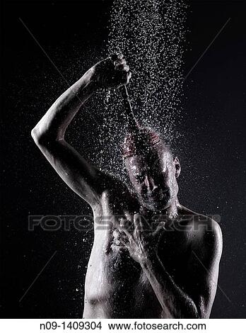 man takes a shower with plunger on his head View Large Photo Image Picture - man takes a shower with plunger on his head. Fotosearch