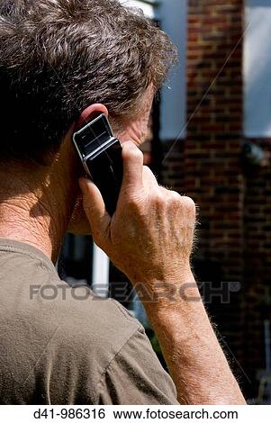 man talking on mobile phone man View Large Photo Image Stock Photograph - man talking on mobile phone man. Fotosearch