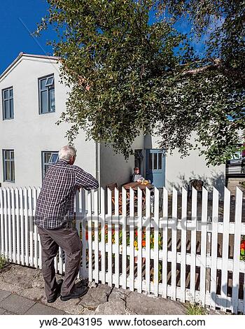Man talking to neighbors, Menninganott-Cultural Festival, Reykjavik, Iceland. View Large Photo Image Stock Photography - Man talking to neighbors, Menninganott-Cultural Festival, Reykjavik, Iceland.. Fotosearch