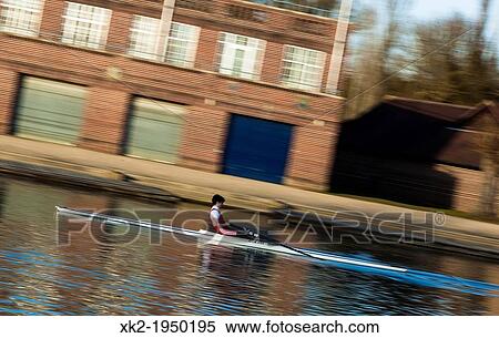 Stock Photography - Man training for a boat race in Oxford, UK. Fotosearch
