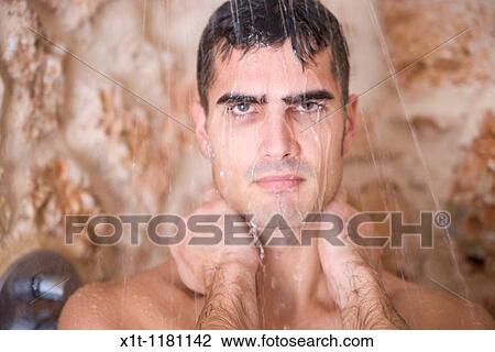 Stock Image - Man under the shower.. Fotosearch
