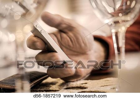 man using a smart phone View Large Photo Image Stock Photo - man using a smart phone. Fotosearch