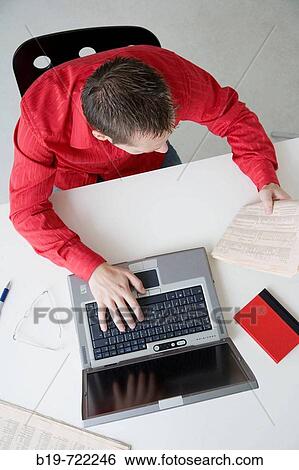 Man using laptop View Large Photo Image Stock Photograph - Man using laptop. Fotosearch