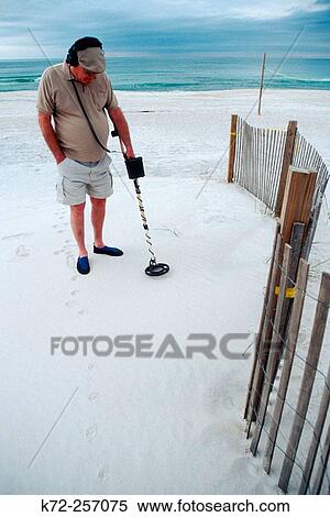 Man using metal detector. Panama City beach, Florida. USA View Large Photo Image Stock Photography - Man using metal detector. Panama City beach, Florida. USA. Fotosearch