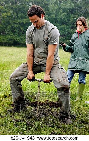 Man using Russian corer to sample peat, climate change research, Neiker-Tecnalia, Unit of Environment, Belate, Navarra, Spain View Large Photo Image Stock Image - Man using Russian corer to sample peat, climate change research, Neiker-Tecnalia, Unit of Environment, Belate, Navarra, Spain. Fotosearch