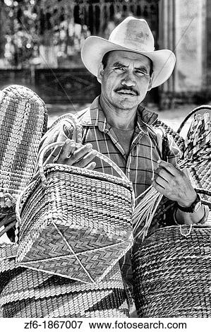 Man vendor selling baskets in San Miguel de Allende Mexico View Large Photo Image Stock Photo - Man vendor selling baskets in San Miguel de Allende Mexico. Fotosearch