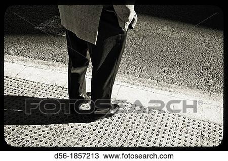 Man waiting in the sidewalk, Valencia, Spain View Large Photo Image Stock Image - Man waiting in the sidewalk, Valencia, Spain. Fotosearch