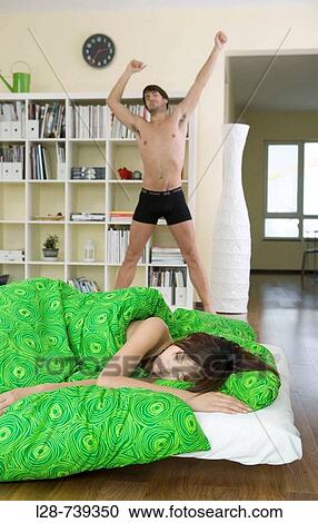 Man wake-up woman sleep View Large Photo Image Stock Image - Man wake-up woman sleep. Fotosearch